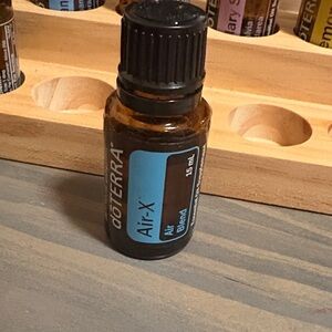 Doterra Air-X Essential Oil Bottle with Blue Label and Black Cap